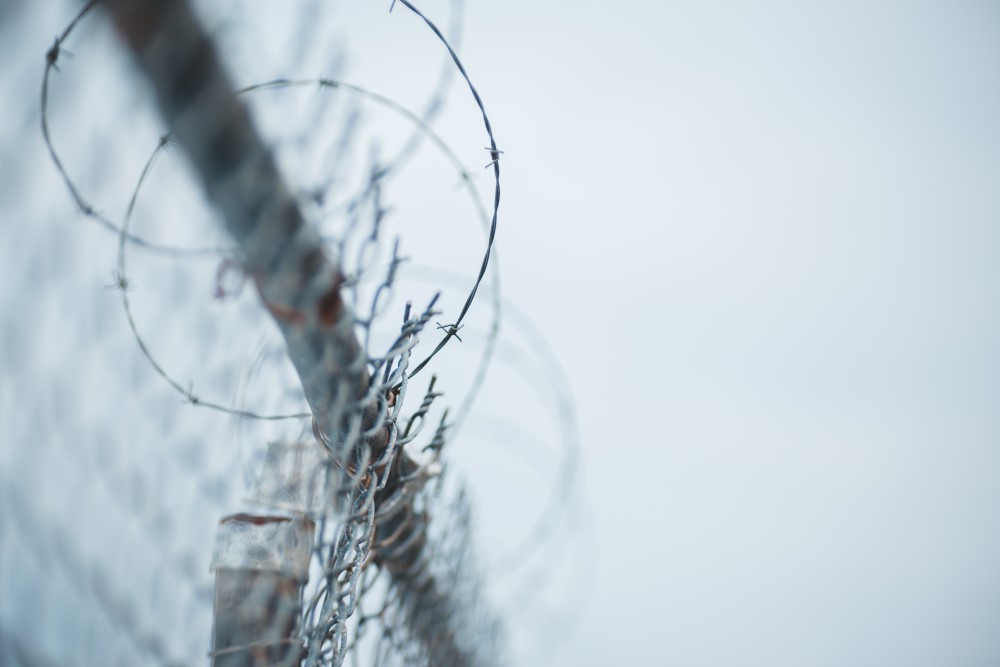 barb wire fence to stop migrants